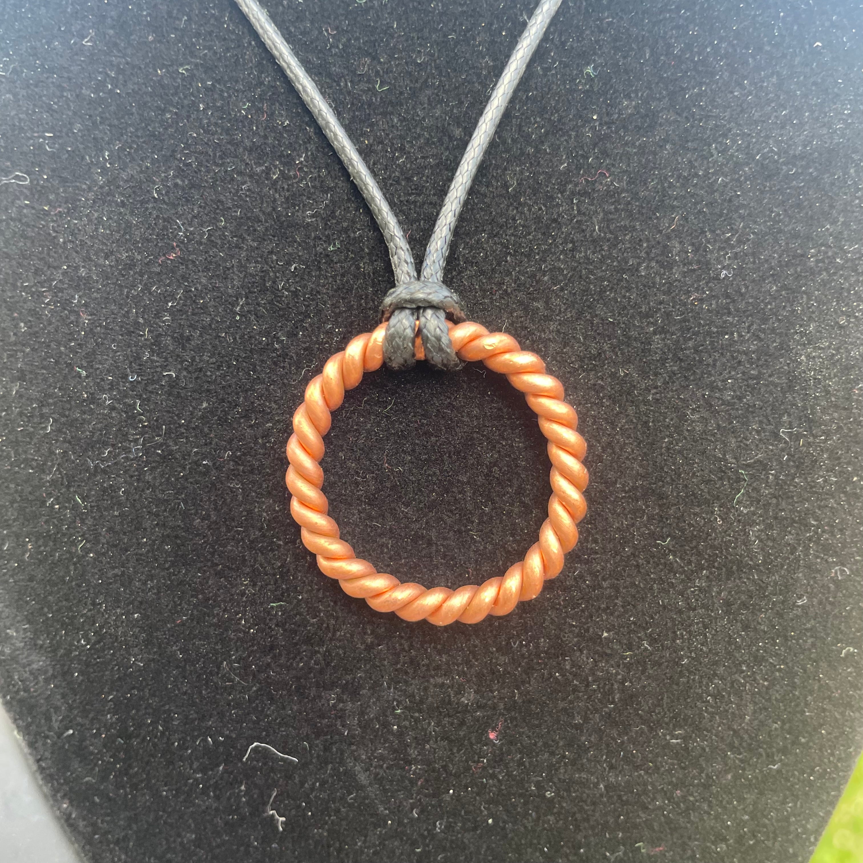 Single twist Copper tensor energy healing pendant